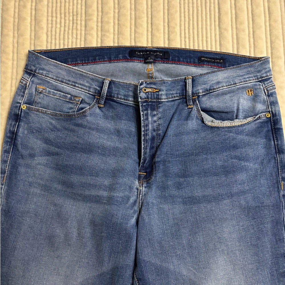 Tommy Hilfiger jeans with embroidered sailboats at hem. Size 14